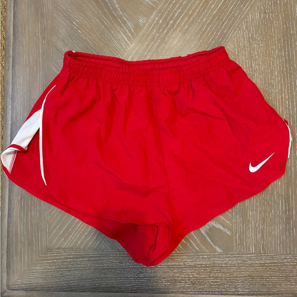 red nike running shorts